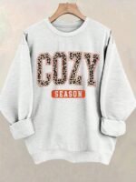 Elorivane Plus Size Leopard Print Letter Graphic Round Neck Loose Pullover Sweatshirt for Winter
