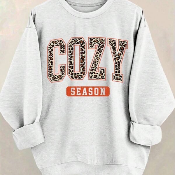 Elorivane Plus Size Leopard Print Letter Graphic Round Neck Loose Pullover Sweatshirt for Winter